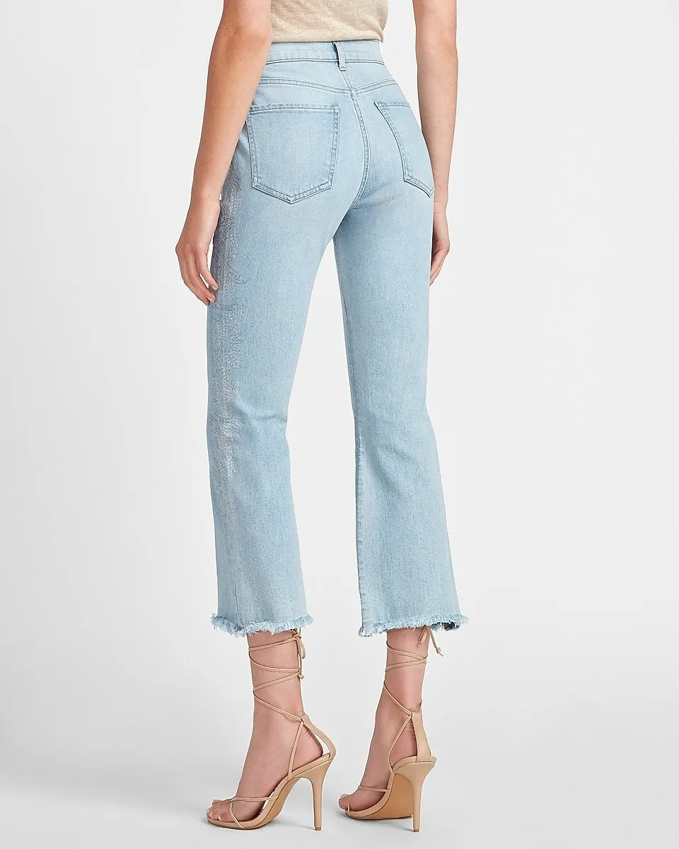 High Waisted Faded Frayed Hem Cropped Flare Jeans in Light Wash